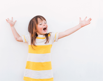 young girl with arm outstretched
