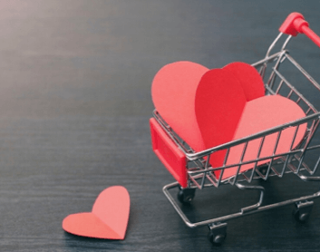 shopping cart containing paper heart