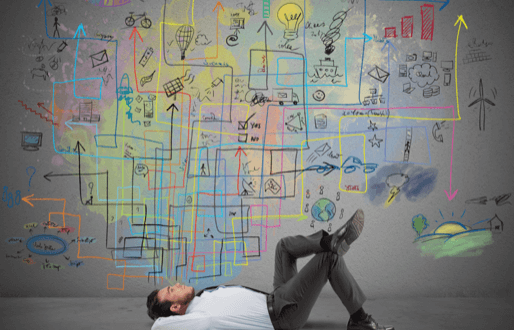 Man lying next to chalk drawing